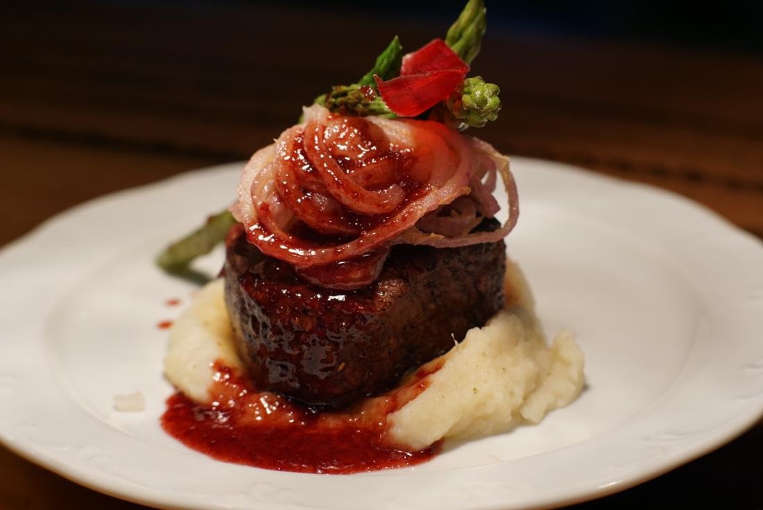 Filet mignon with cabernet reduction over garlic mash